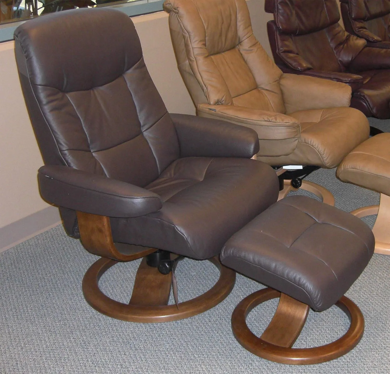 Large Leather Swivel Recliner Chair with Ottoman in Havana Dark Brown NL 120 Nordic Line Leather with a Chocolate Wood Stain Base